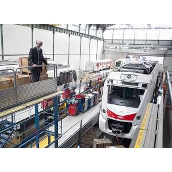 Riccardo Riccardi (Assessore regionale Infrastrutture) nello stabilimento della "CAF-Construcciones y Auxiliar de Ferrocarriles", visita le linee di produzione dei nuovi treni acquistati dalla Regione. (Beasain, Paesi Baschi, 27/03/12)