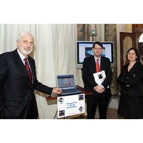 Lodovico Sonego (Assessore regionale alla pianificazione territoriale, energia, mobilità e infrastrutture di trasporto) con Michela Del Piero (Assessore regionale alla programmazione e controllo, alle risorse economiche e finanziarie, al patrimonio e servizi generali e alle pari opportunità) e Giovanni Pittino (Amministratore Delegato di Mercurio spa) ritratti in occasione del convegno "Mercurio" per banda larga in Friuli Venezia Giulia. (Villa Manin 19/02/07)