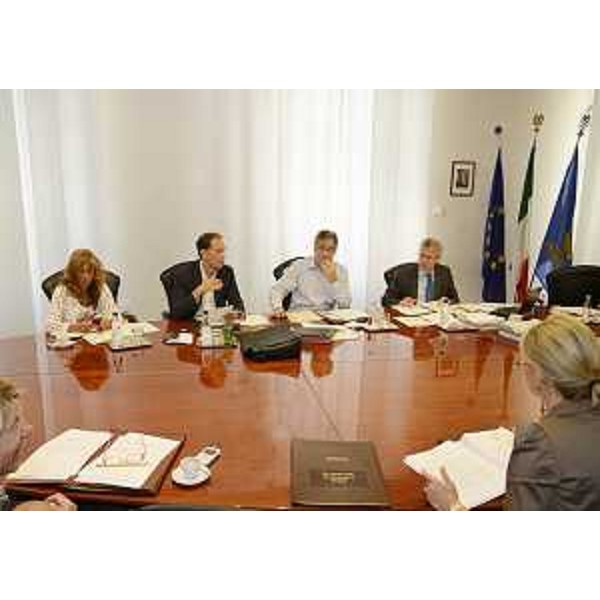 Michela Gasparutti (Capo segreteria presidente Tondo), Luca Ciriani (Vicepresidente Regione FVG), Renzo Tondo (Presidente Friuli Venezia Giulia) e Daniele Bertuzzi (Segretario generale Presidenza Giunta regionale) durante la riunione della Giunta regionale. (Trieste 06/09/12)