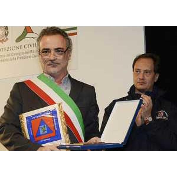 Maino Benatti (Sindaco Mirandola) e Luca Ciriani (Vicepresidente FVG e assessore regionale Protezione civile) all'annuale festa di ringraziamento della Regione alla Protezione civile del FVG. (Pordenone 01/12/12)