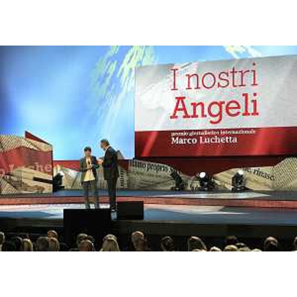 Debora Serracchiani (Presidente Friuli Venezia Giulia) intervistata dal giornalista Giovanni Marzini sul palco del Teatro Rossetti durante la serata “I nostri angeli”. (Trieste 03/07/13)