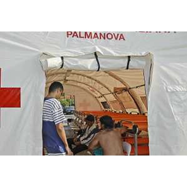 Centro di prima accoglienza per i profughi allestito dalla Croce Rossa Italiana (CRI) – Palmanova 12/08/2014