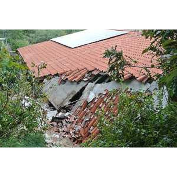 La casa colpita da una frana causata dal maltempo, sulla strada per Lazzaretto - Muggia (TS) 15/10/2014