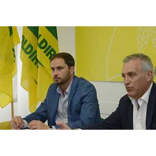 Cristiano Shaurli (Assessore regionale Risorse agricole e forestali) e Dario Ermacora (Presidente Coldiretti FVG) durante la riunione del consiglio direttivo della Coldiretti del FVG - Udine 18/06/2015