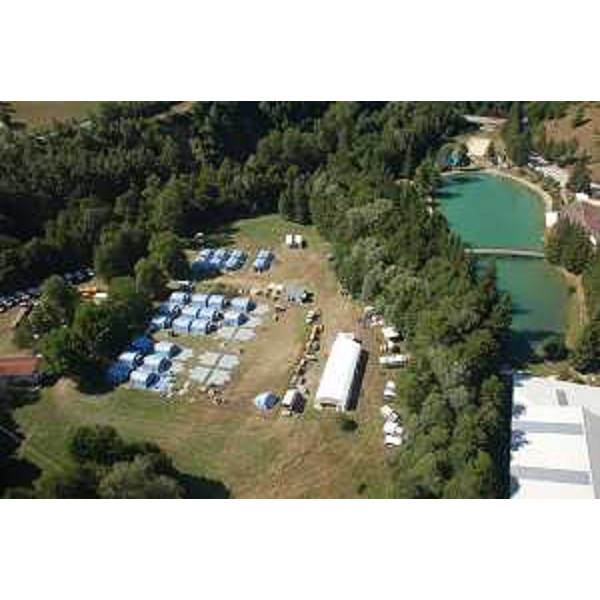 La tendopoli che la Protezione civile del Friuli Venezia Giulia sta approntando nello spiazzo attiguo all'Agriturismo Lo Scoiattolo, a circa un chilometro e mezzo dal centro di Amatrice (Rieti) - 25/08/2016