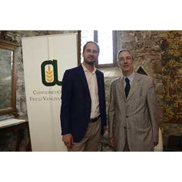 Cristiano Shaurli (Assessore regionale Risorse agricole e forestali) e Claudio Cressati (Presidente Confagricoltura FVG) all'Assemblea dei delegati di Confagricoltura FVG- Manzano 04/07/2017