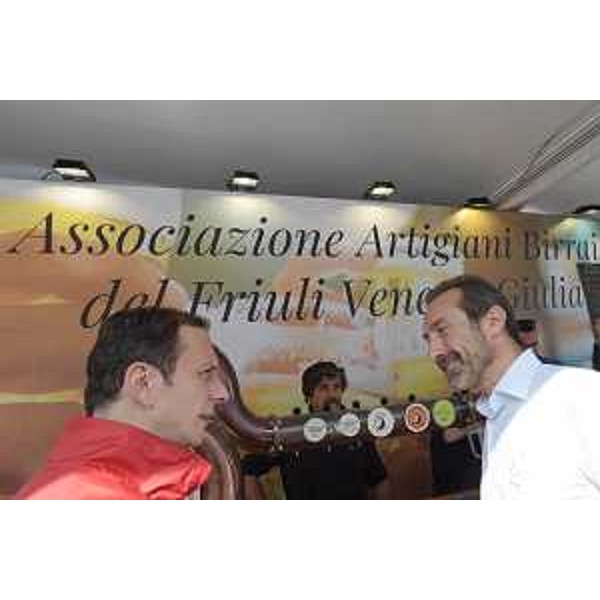 Il governatore Massimiliano Fedriga e il direttore di PromoTurismoFvg, Lucio Gomiero, in Barcolana allo stand di PromoTurismoFvg