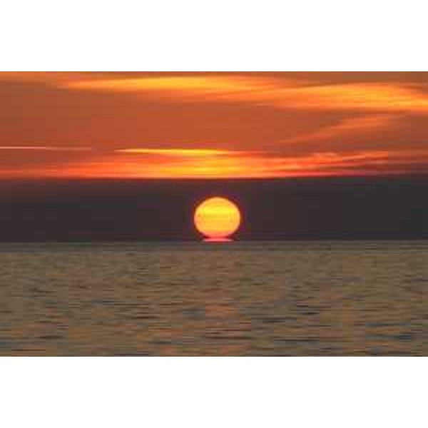 Il sole tramonta sul Golfo di Trieste. Foto: Archivio del Corpo forestale regionale - Marco Pradella