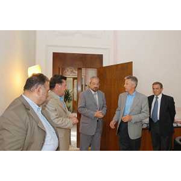 Riccardo Illy (Presidente Friuli Venezia Giulia) con i Rettori degli atenei di Udine, Furio Honsel, e di Trieste, Lucio Delcaro, e il Direttore della Sissa Edoardo Boncinelli a Palazzo Florio a Udine. (Udine 21/07/03) 