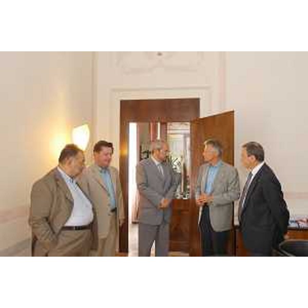 Riccardo Illy (Presidente Friuli Venezia Giulia) con i Rettori degli atenei di Udine, Furio Honsel, e di Trieste, Lucio Delcaro, e il Direttore della Sissa Edoardo Boncinelli a Palazzo Florio a Udine. (Udine 21/07/03) 
