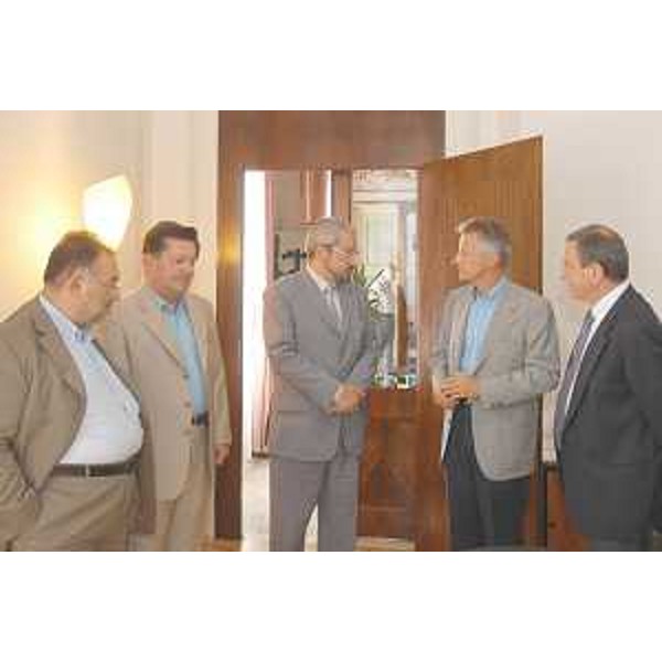 Riccardo Illy (Presidente Friuli Venezia Giulia) con i Rettori degli atenei di Udine, Furio Honsel, e di Trieste, Lucio Delcaro, e il Direttore della Sissa Edoardo Boncinelli a Palazzo Florio a Udine. (Udine 21/07/03) 