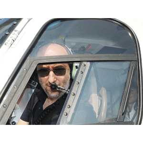 Riccardo Riccardi (Assessore regionale Viabilità e Trasporti) pronto a sorvolare la A4 Venezia-Trieste in direzione Est con un elicottero della Protezione civile. (01/08/09)