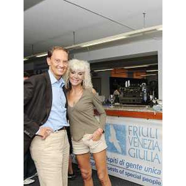 Luca Ciriani (Vicepresidente FVG e Assessore regionale Attività produttive) e Donatella Rettore (Cantante) allo Stadio Friuli per il concerto della band britannica "Coldplay". (Udine 31/08/09)