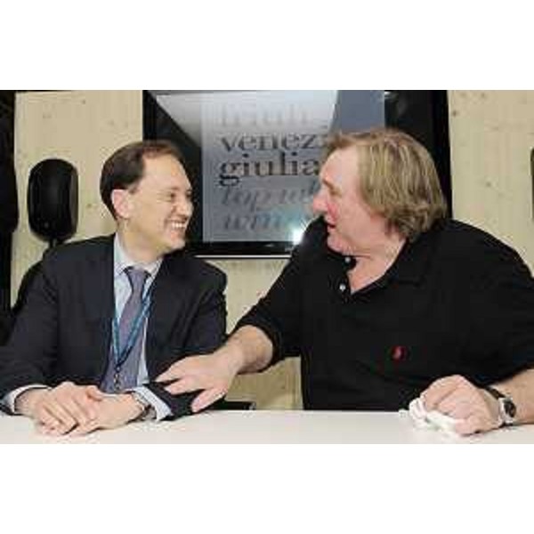 Luca Ciriani (Vicepresidente FVG e Assessore regionale Attività produttive) con Gerard Depardieu (Attore, enologo, gourmet) nello stand del Friuli Venezia Giulia alla 44a edizione di Vinitaly. (Verona 10/04/10)
