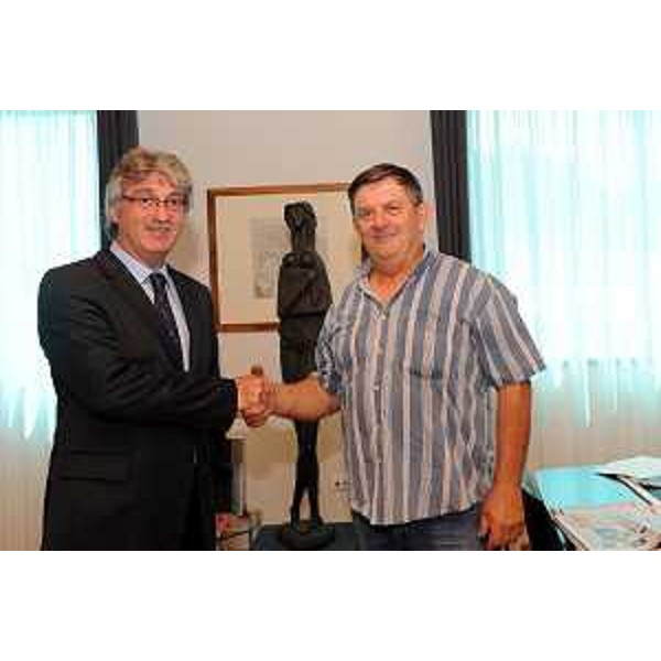 Renzo Tondo (Presidente della Regione Friuli Venezia Giulia) durante il suo incontro con Adriano Sattolo (coordinatore festa patrono degli infermieri). (Udine, 14/07/2010)