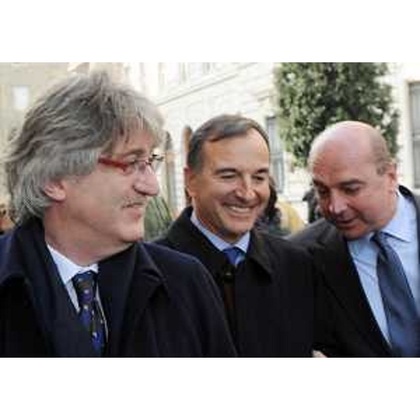 Renzo Tondo (Presidente Friuli Venezia Giulia), Franco Frattini (Ministro Affari esteri) e Roberto Dipiazza (Sindaco Trieste) in occasione della presentazione della mostra "Luigi Einaudi, una vita per l'Italia e per l'Europa", in piazza Unità d'Italia. (Trieste 11/02/11)